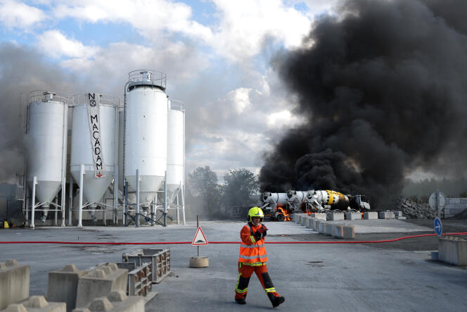 A firefighter, after a fire in a cement factory caused by demonstrators, during a demonstration against the A69 motorway project between Toulouse and Castres, in Castres, on October 21.