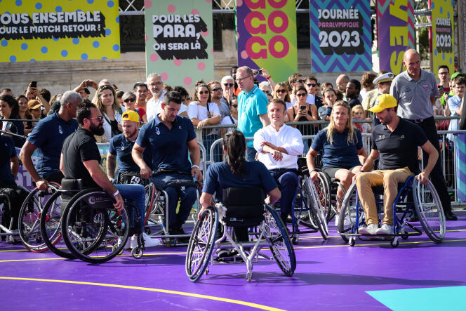 Emmanuel Macron participates in a wheelchair basketball match during Paralympic Day, October 8, 2023.