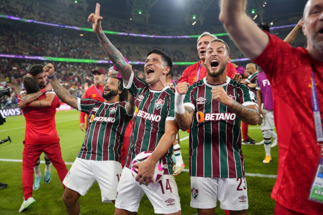 Fluminense players celebrate their victory (2-0) against the Egyptians Al-Ahly in the semi-finals of the Club World Cup, in Jeddah, Saudi Arabia, on December 18, 2023.