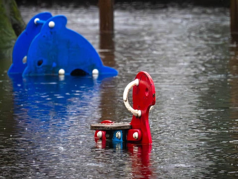 A playground is under water.