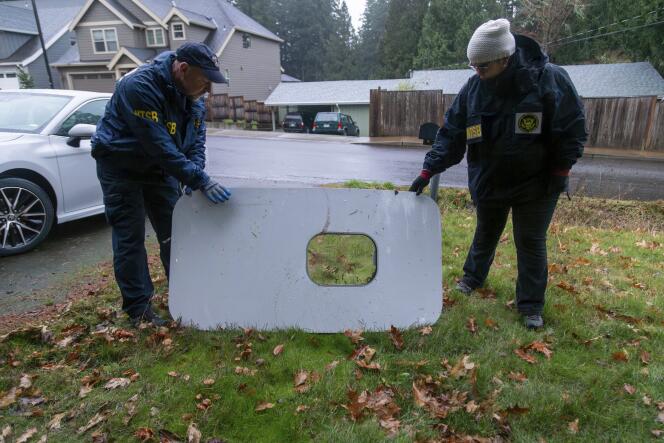 The door of the damaged Alaska Airlines plane found in a backyard in Portland, Oregon, on January 8, 2024, in a photo released by the National Transportation Safety Board.