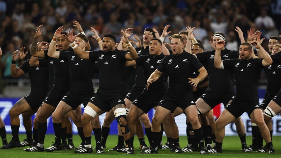 Members of the New Zealand national rugby team perform the haka.