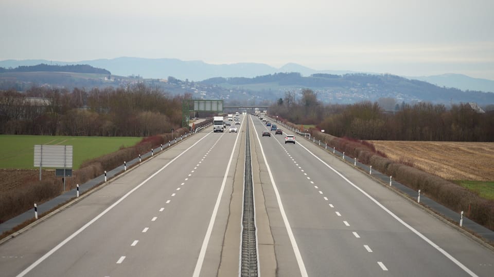 View of the highway with a total of four lanes
