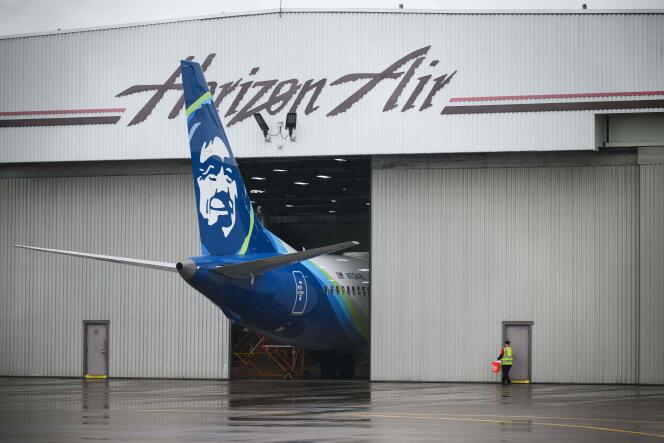 The Alaska Airlines plane that lost a door in flight, in a hangar at Portland International Airport, Oregon, January 9, 2024.