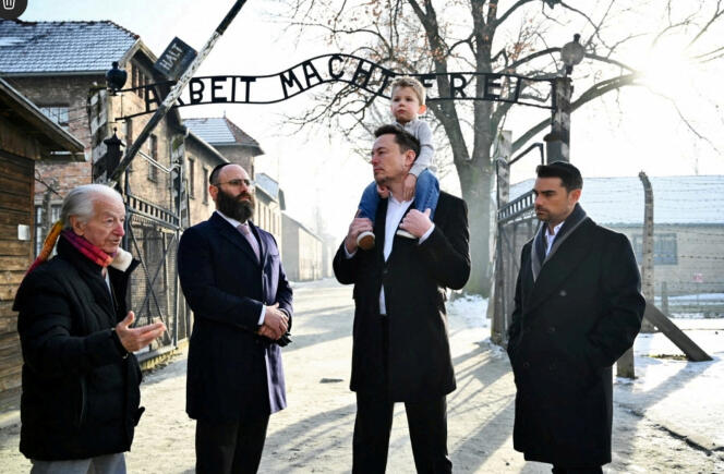 Holocaust survivor Gidon Lev, Rabbi Menachem Margolin, Elon Musk and columnist Ben Shapiro (from left) at the Auschwitz-Birkenau site in Oswiecim, Poland, January 22, 2024. 