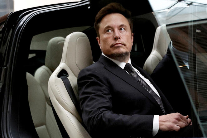 Elon Musk in a Tesla car, in Beijing, China, May 31, 2023.