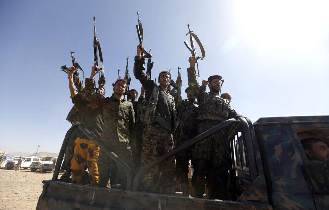 Houthi recruits parade in a military vehicle in Sanaa, the capital of Yemen, January 3, 2017.