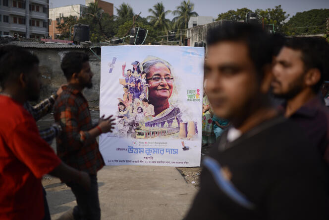 An election poster of the Awami League and its leader, Sheikh Hasina, on a street in Dhaka, January 7, 2024. 