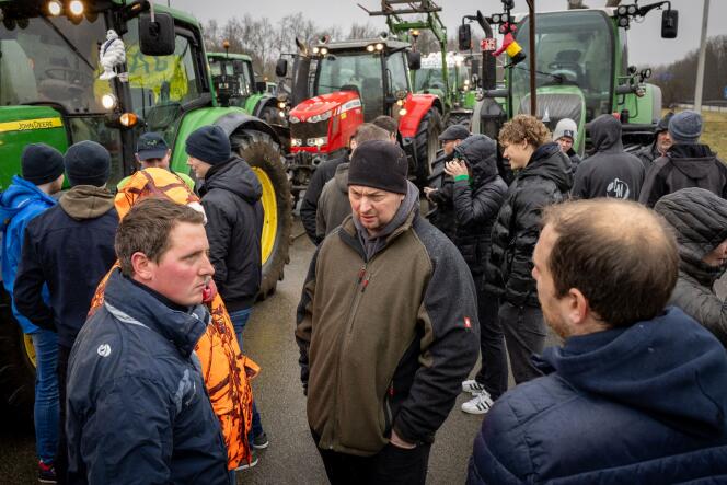 Belgian farmers gather at the Belgian-French border, in Aubange, on January 26, 2024, during a demonstration to demand better production conditions and the maintenance of a suitable income.