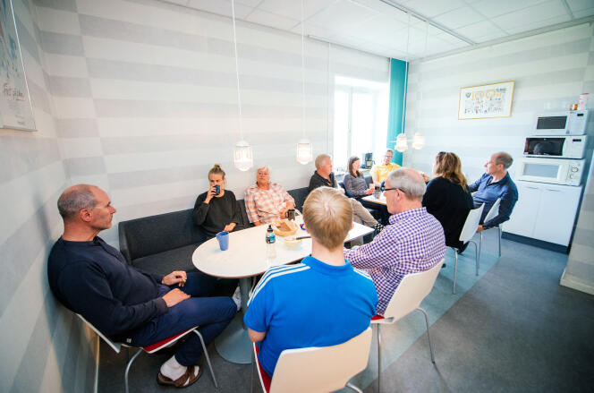 Workers of the Swedish Handball Federation (SHF) gather for a traditional 'fika' coffee break in Stockholm, May 27, 2015.