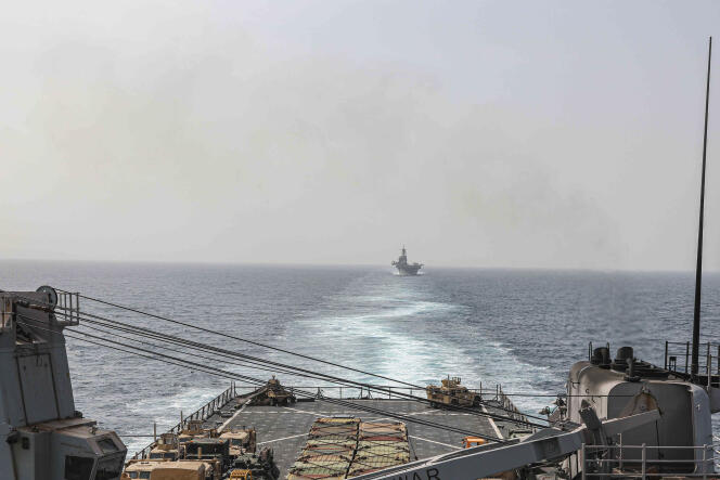 In this image provided by the US Navy, the amphibious landing ship 'USS Carter Hall' and the amphibious assault ship 'USS Bataan' transit the Bab el-Mandeb Strait, August 9, 2023.