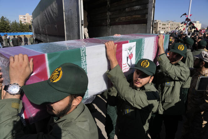 Members of the Revolutionary Guards carry the coffin of a victim of the double explosion on Wednesday, during the funeral ceremony in the city of Kerman, about 820 kilometers southeast of Tehran, on January 5, 2024.