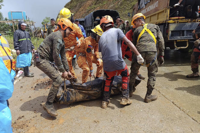 Rescuers respond to a landslide on the island of Davao de Oro, Philippines, January 18, 2024.