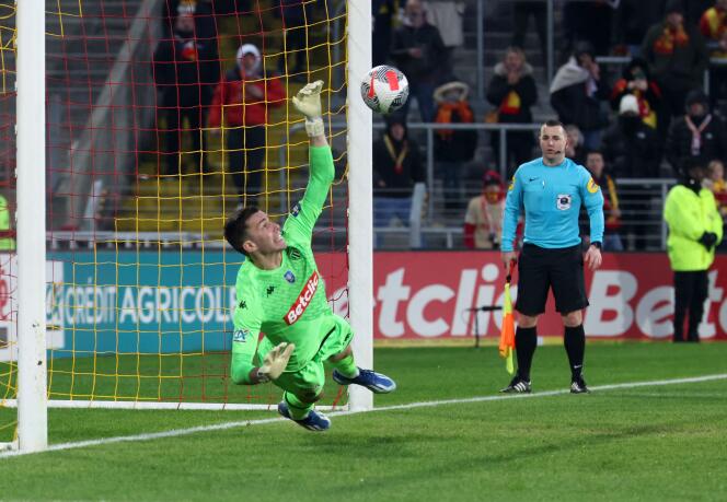 AS Monaco goalkeeper Radoslaw Majecki saves a shot on goal during the 32nd final of the Coupe de France against Lens.