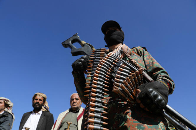 A Houthis takes part in a demonstration against recent strikes carried out by the United States on Yemeni rebel targets, near Sanaa, January 14, 2024.