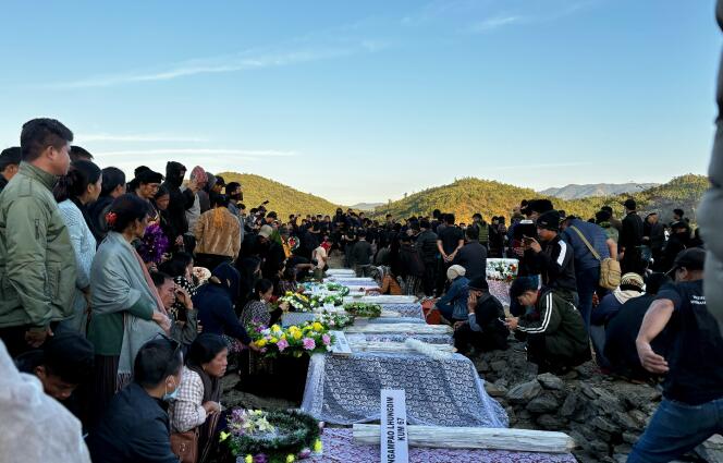 During the burial of victims of inter-ethnic violence at the village cemetery of Sekhen, Manipur (India), December 20, 2023.