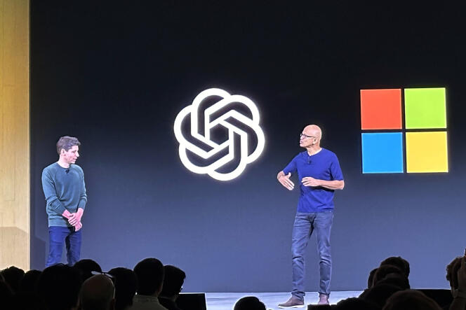 OpenAI CEO Sam Altman, left, appears on stage with Microsoft CEO Satya Nadella during the first OpenAI Developer Conference on November 6, 2023, in San Francisco, California.
