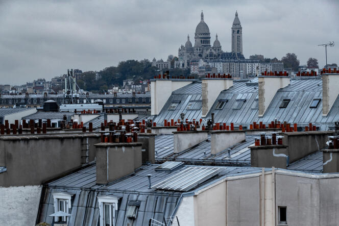 Rooftops of Paris with the Sacré-Cœur in the background, in November 2021.