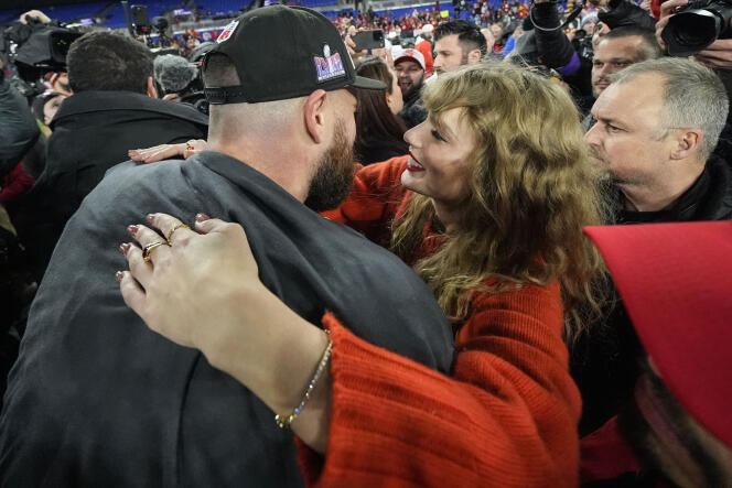 Taylor Swift hugs her boyfriend, Kansas City player Travis Kelce, after the Chiefs' victory over the Ravens in Baltimore, Maryland, on January 28, 2024.
