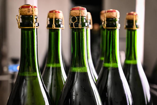 Bottles from the French champagne house Bollinger on a control and quality chain, December 2, 2020, in Ay, near Epernay (Marne).