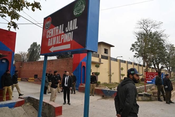 Police officers stand outside the entrance to Adiala Prison during the hearing of former Prime Minister Imran Khan in Rawalpindi on January 30, 2024. 
