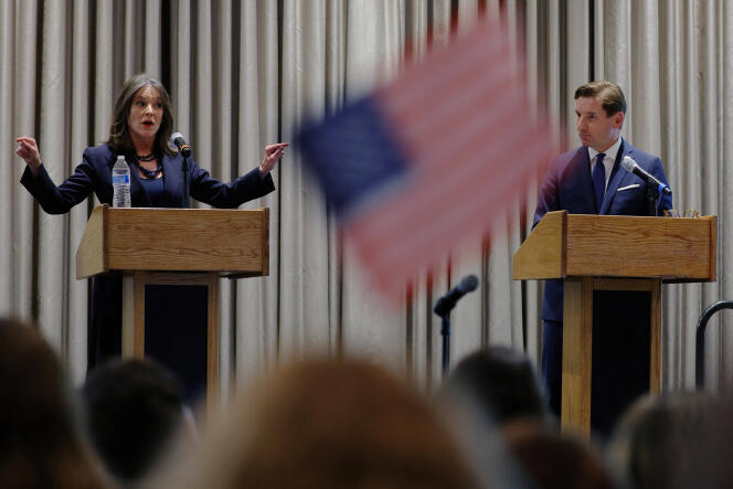Marianne Williamson and Dean Phillips participate in the Democratic candidate debate at the 2024 College Convention in Manchester, New Hampshire on January 8, 2024. 