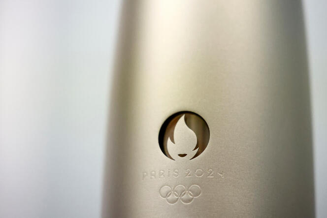 The Paris 2024 logo on an Olympic torch.