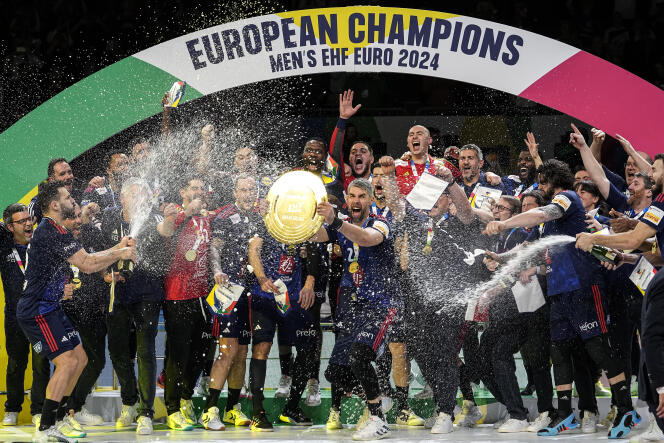 Frenchman Luka Karabatic celebrates with his team their victory at the European Handball Championship after beating Denmark, in Cologne, Germany, January 28, 2024.