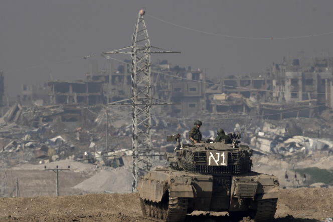 Israeli soldiers on an assault tank, in the Gaza Strip, Friday January 19, 2024.
