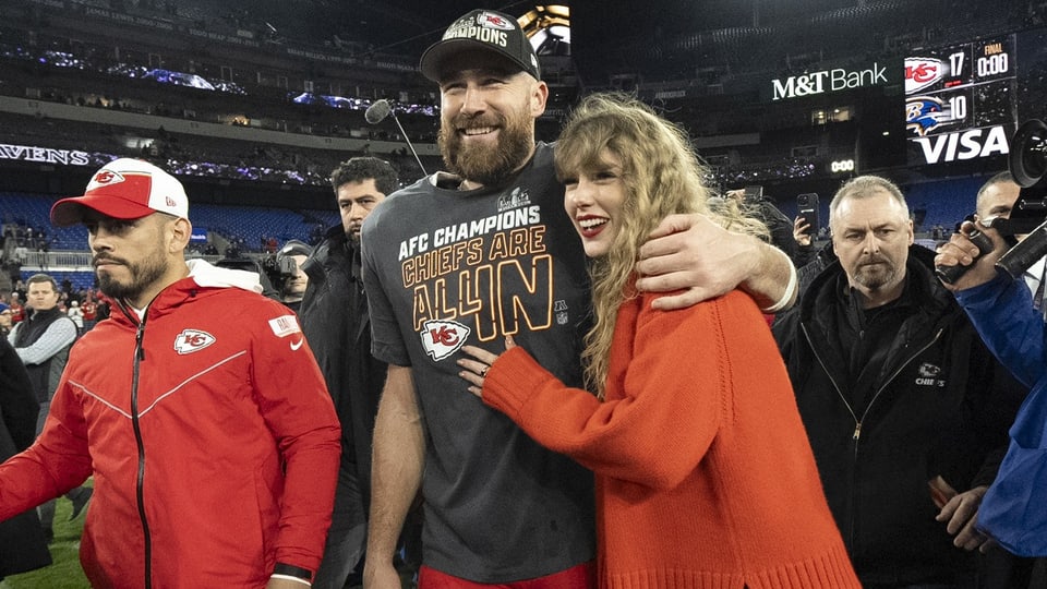Taylor Swift with Travis Kelce after a football game in Baltimore. 