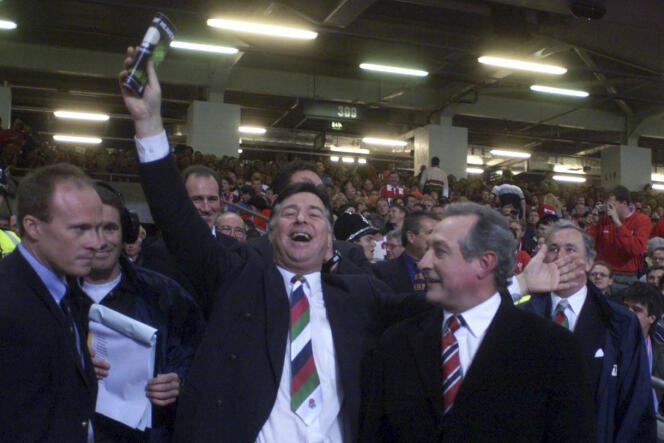Barry John (centre) and Gareth Edwards (right) at the Rugby World Cup opening ceremony in Cardiff, 1999