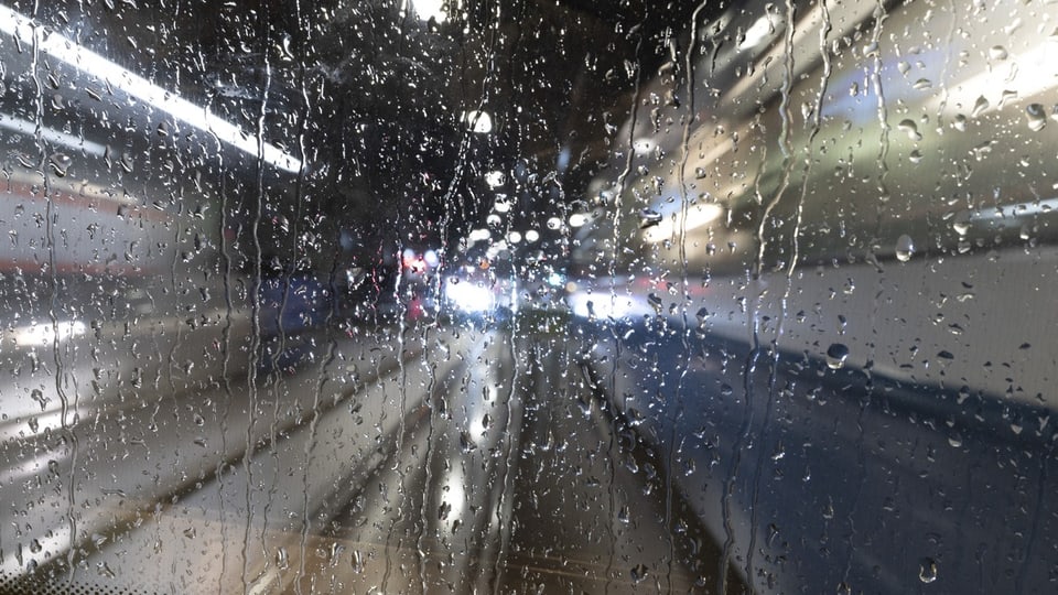 Shot through a rainy tram window.  Symbolic image.