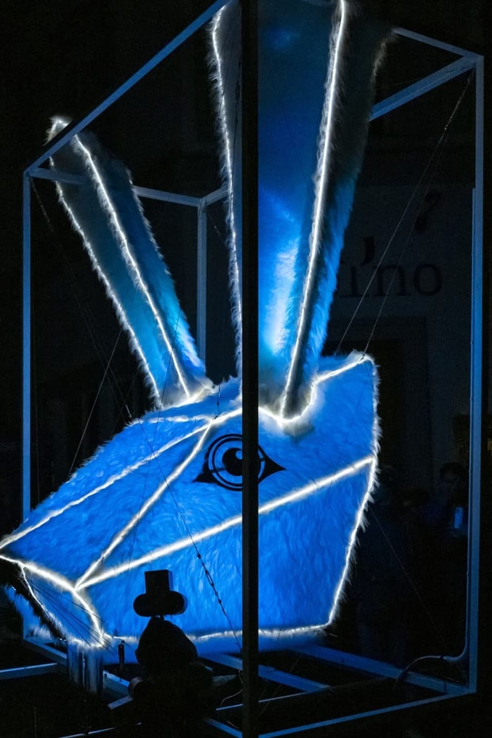 A futuristic, illuminated subject of a rabbit in blue.