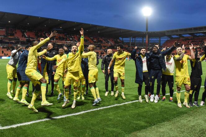 Nantes players celebrate their victory (1-0) after their match against FC Lorient, at the Moustoir stadium, February 24, 2024.