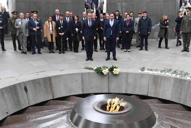 French Defense Minister Sebastien Lecornu and his Armenian counterpart Suren Papikyan, in front of the Armenian genocide monument, in Yerevan, February 23, 2024. (Photo by KAREN MINASYAN / AFP)