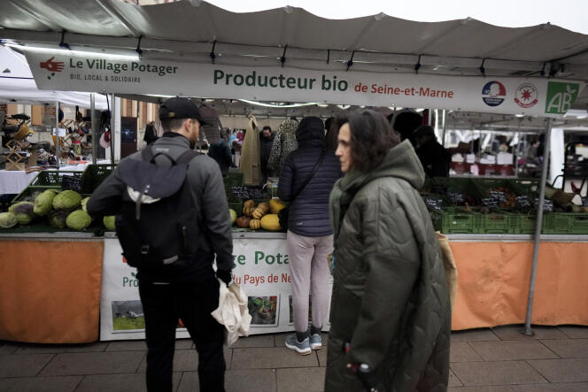 An organic producer sells his products at a market in Fontainebleau (Seine-et-Marne), south of Paris, on February 2, 2024.