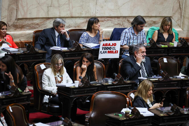 A poster reading “Down with Milei's plan” during a debate on the omnibus law, the Argentine president's ultraliberal economic reform program in Congress, in Buenos Aires, January 31, 2024.