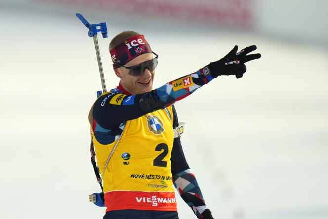 Johannes Boe celebrates his victory in the mass start of the Biathlon World Championships in Nove Mesto, Czech Republic, February 18, 2024. 