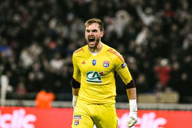 Lyon goalkeeper Lucas Perri after saving a penalty against Strasbourg in the quarter-finals of the Coupe de France, at Groupama Stadium, in Decines-Charpieu, near Lyon, on February 27, 2024.
