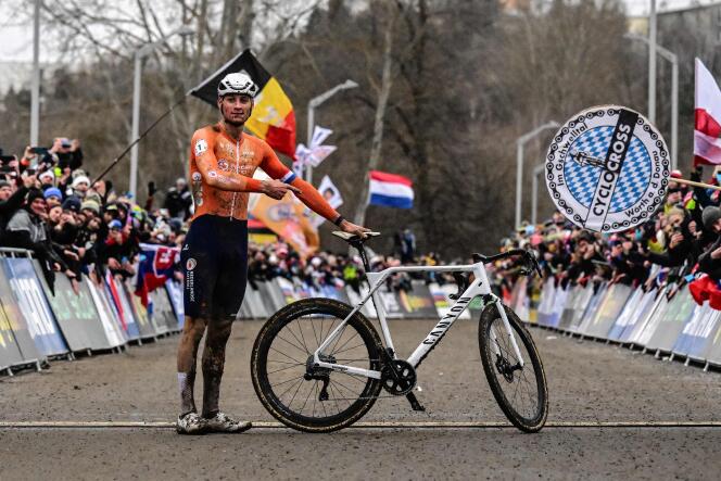 Mathieu van der Poel celebrates his victory at the cyclo-cross world championships in Tabor (Czech Republic), February 4, 2024.