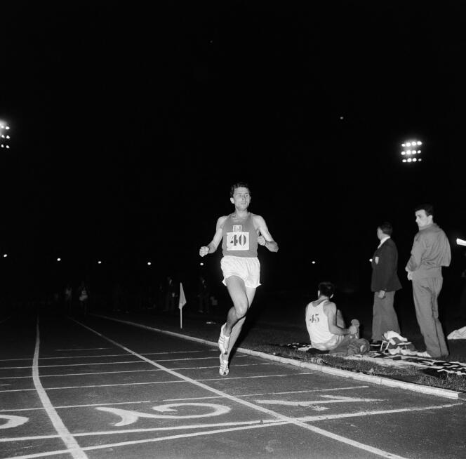 French athlete Michel Jazy crosses the finish line of the 1500 meters on August 23, 1962 at the Charléty stadium in Paris, during the France-Greece competition.
