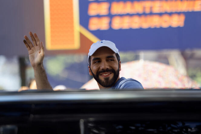 El Salvador's President Nayib Bukele of the Nuevas Ideas party, who is running for re-election, salutes as he participates in voting during the presidential and parliamentary elections at a polling station in San Salvador, February 4, 2024. 