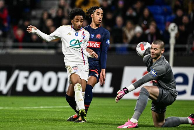 Lyon striker Malick Fofana, Lille defender Leny Yoro and Lille goalkeeper Lucas Chevalier during the Coupe de France match between Olympique Lyonnais and Lille, at Groupama Stadium, in Lyon, on February 7, 2024.
