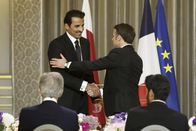 The Emir of Qatar, Tamim Ben Hamad Al Thani, with French President Emmanuel Macron, during a state visit to the Elysée, February 27, 2024.  