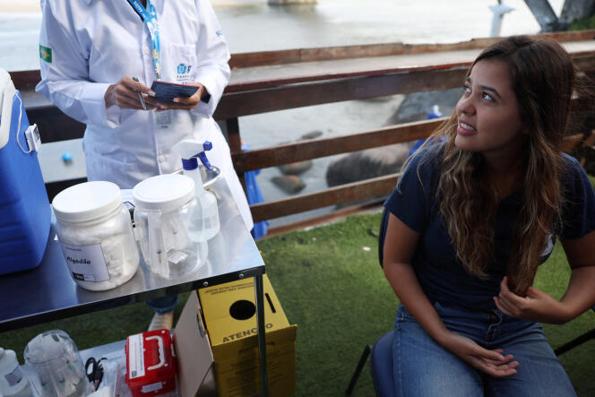 A 24-year-old woman will receive an injection of the Qdenga dengue vaccine, as part of research to evaluate the vaccine's effectiveness, in Rio de Janeiro, February 16, 2024.