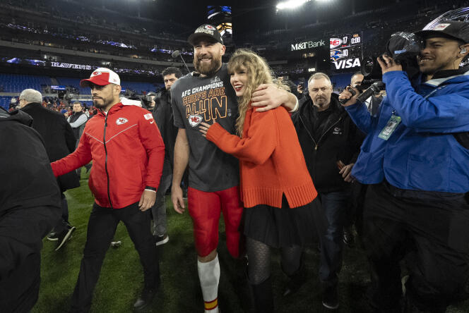 Singer Taylor Swift with her companion, Kansas City Chiefs player Travis Kelce, in Baltimore, January 28, 2024.