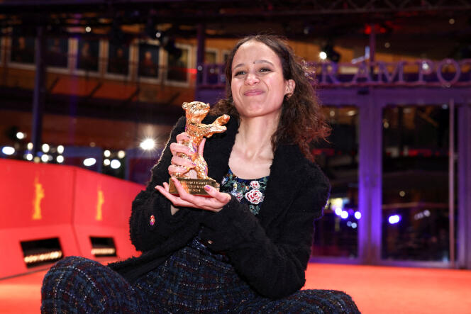 Director Mati Diop poses with the Golden Bear for best film for “Dahomey”, after the awards ceremony of the 74th Berlinale, in Berlin, February 24, 2024.
