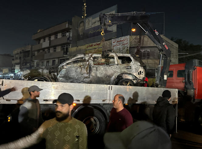 Vehicle destroyed by a drone, Wednesday February 7, 2024, in Baghdad.