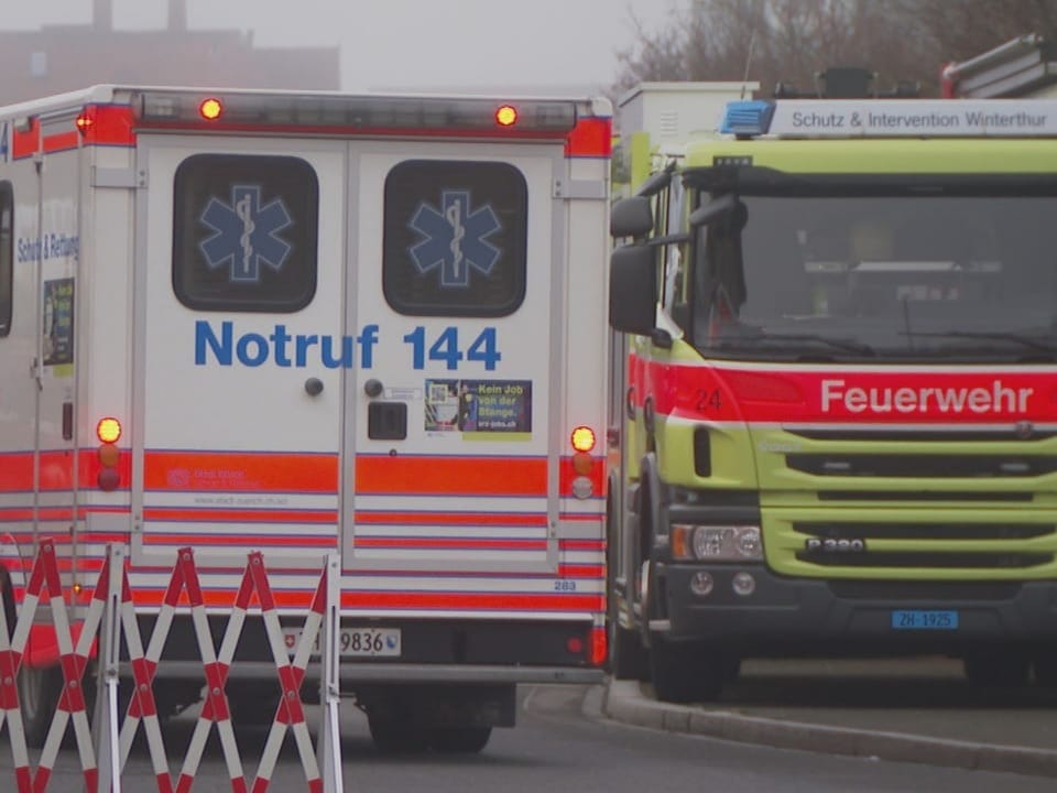 A medical vehicle is parked next to a fire engine.