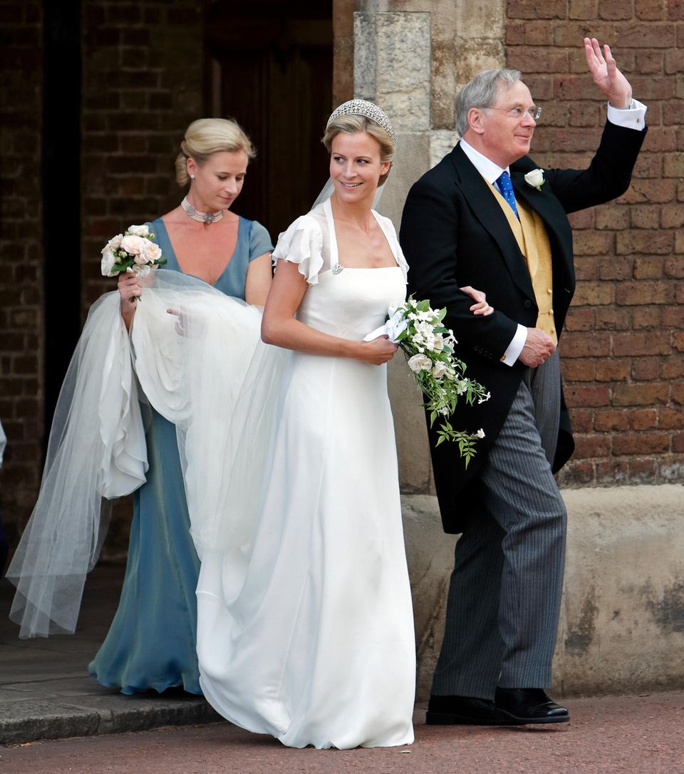 July 19, 2008: Lady Rose Windsor gets married in the Queen's Chapel.  At her side are her younger sister Lady Davina Lewis and father Richard, Duke of Gloucester.